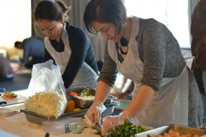 teams cooking at the food truck challenge experience