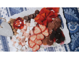 Hot Chocolate Charcuterie Board with cookies and strawberries